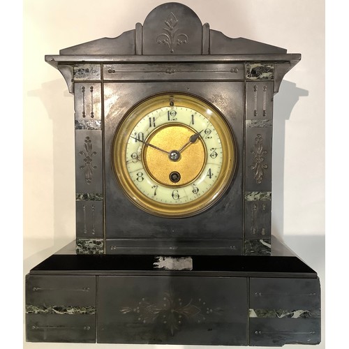 180 - A 19th century belge noir mantel clock, 33cm high