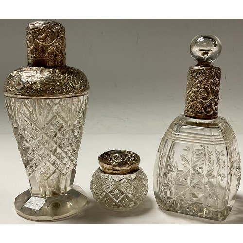 312 - An Edwardian silver mounted scent bottle, Birmingham 1909; another; a silver mounted rouge pot (3)