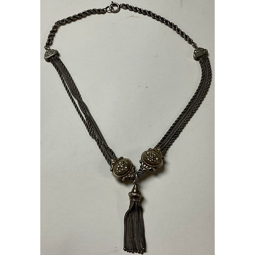 325 - A Victorian Albertina and tassel, converted to a necklace, probably silver, unmarked