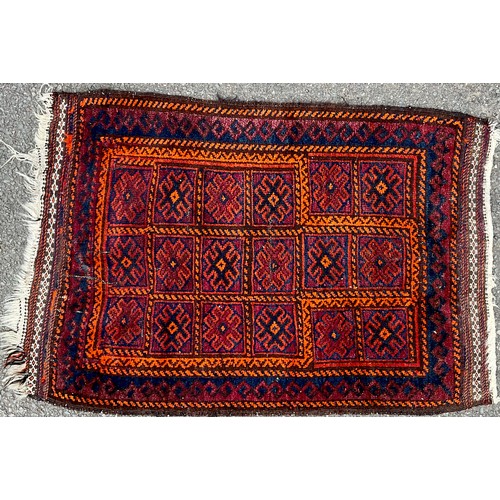 465 - A Middle Eastern rectangular ‘prayer rug’ or carpet, 122cm x 78cm