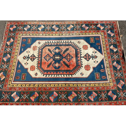 468 - A Turkish wool rug or carpet, 334cm x 239cm