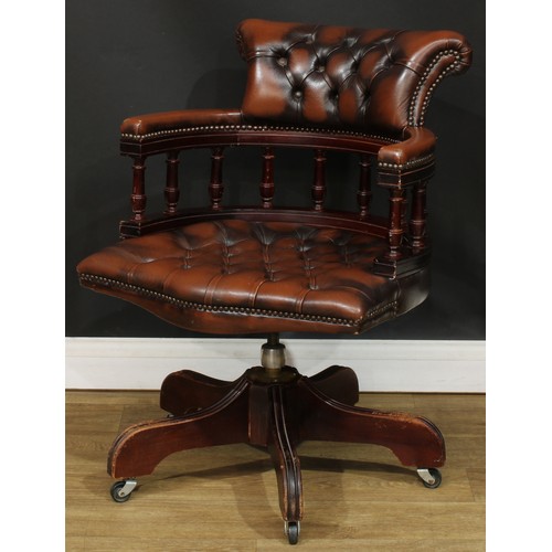 202 - A Victorian style swivel desk chair, 85.5cm high, 61cm wide, the seat 50cm wide and 42cm deep