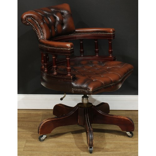 202 - A Victorian style swivel desk chair, 85.5cm high, 61cm wide, the seat 50cm wide and 42cm deep