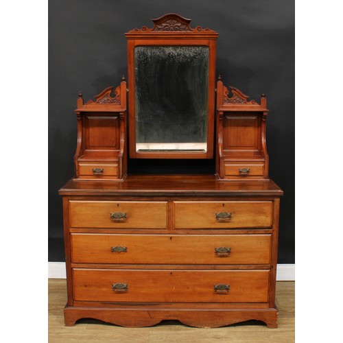 310 - A late Victorian walnut dressing chest, the superstructure with a mirror, open niches and small draw... 