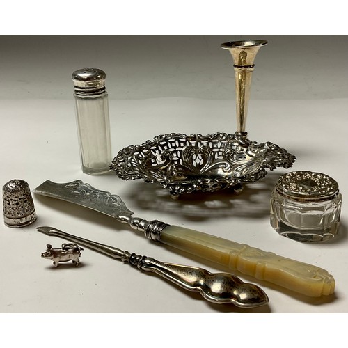 314 - A Victorian silver and mother of pearl butter knife, Birmingham 1848; a silver sweetmeat dish; speci... 