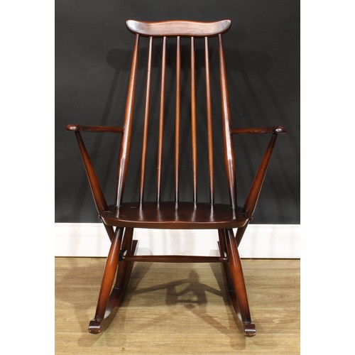 577 - An Ercol Goldsmith rocking chair, 85cm high, 62cm wide, the seat 37cm wide and 30cm deep