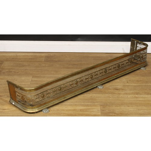 581 - A pierced brass fire curb or fender, paw feet, 21cm high, 145cm wide, 30.5cm deep; nursery fender, 6... 