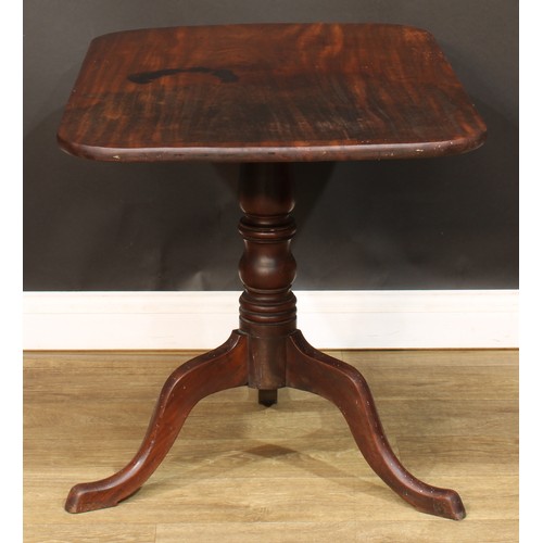 583 - A 19th century mahogany tripod occasional table, rounded rectangular tilting top, turned column, cab... 