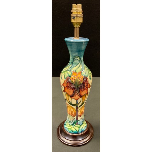 50 - A contemporary Moorcroft Arum Lily pattern baluster lamp base, designed by Nicola Slaney, tube lined... 