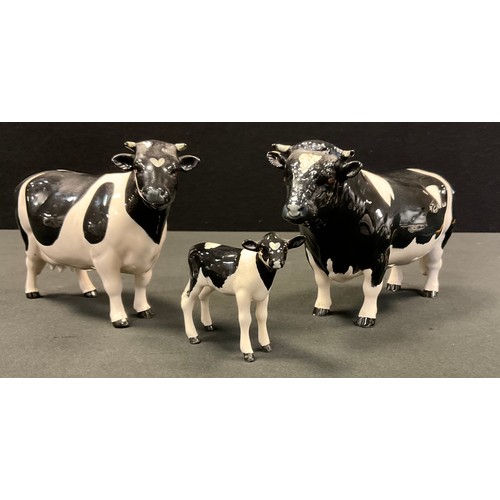 8 - A Beswick Friesian bull, CH Coddington Hilt Bar, modelled by Arthur Gredington, 12cm high, printed m... 