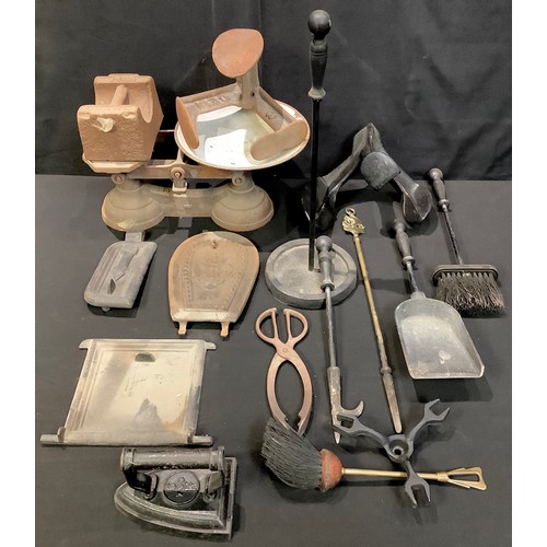 619 - Metalware - a cobbler's last, another, weighing scales, three 19th century chimney plates, companion... 