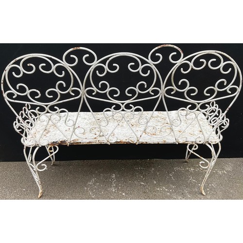 3021 - An early 20th century three seat wire work garden bench, scroll back and legs, solid seat, 113cm wid... 