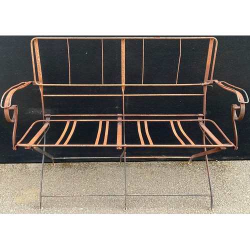 3050 - An early 20th century wirework folding garden seat, scroll arms, 95cm high, 116cm wide


**Please no... 