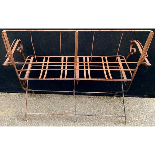 3050 - An early 20th century wirework folding garden seat, scroll arms, 95cm high, 116cm wide


**Please no... 