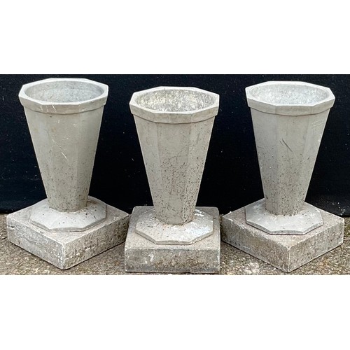 3053 - A set of three  Art Deco cemetery vases, of panelled trumpet form, square bases, 29cm high


**Pleas... 