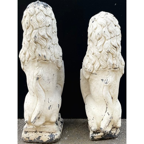 3022 - A pair of reconstituted heraldic garden lions rampant, each supporting a shield, 82cm high


**Pleas... 