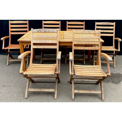 3062 - A hardwood garden table and six folding armchairs, by Royal Craft, labelled, the table 74cm high, 15... 