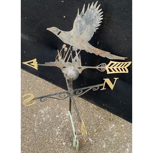 3063 - A painted steel weather vane, the silhouette cresting as a pheasant, 56.5cm diam


**Please note tha... 