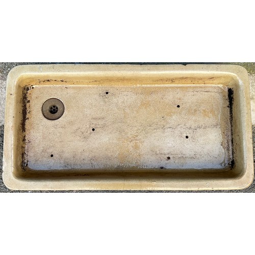 3000 - A low rounded rectangular Belfast garden sink, 91cm high, 45cm wide


**Please note that some of the... 