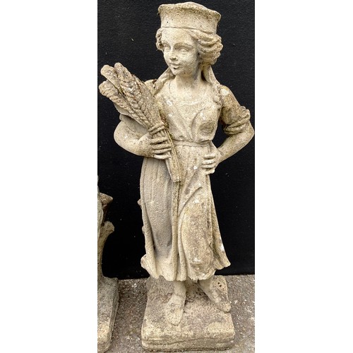 3058 - A set of four reconstituted garden statues, Allegorical of the Seasons, square bases, 77cm high


**... 