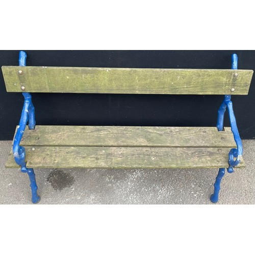 3127 - A cast iron and wood garden bench, branch effect scroll arms, now painted blue length 145.5cm height... 