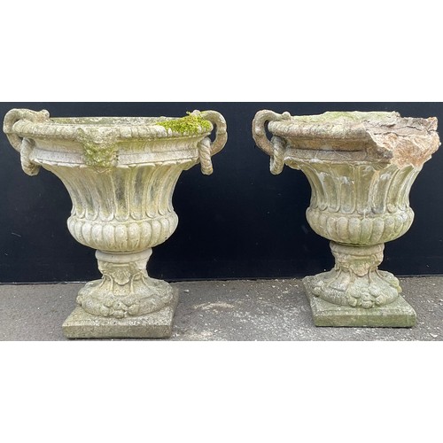 3129 - A pair of composite garden urns, fluted, ring loop handles, lion masks to sides, square bases



**P... 