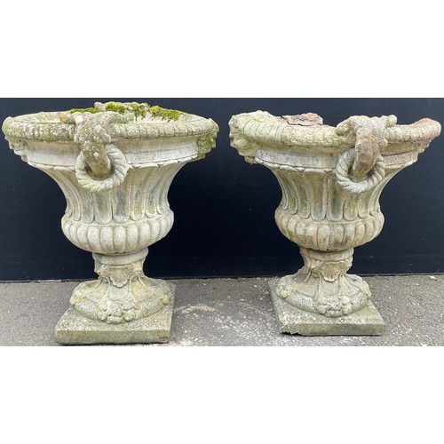 3129 - A pair of composite garden urns, fluted, ring loop handles, lion masks to sides, square bases



**P... 