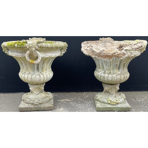 3129 - A pair of composite garden urns, fluted, ring loop handles, lion masks to sides, square bases



**P... 