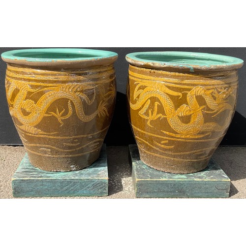 3130 - A pair of glazed dragon pots height 49.5cm by 50cm


**Please note that some of the lots in this auc... 