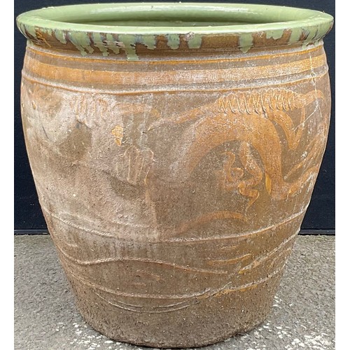 3131 - A garden planter, decorated with a dragon in mustard, on a tan ground


**Please note that some of t... 