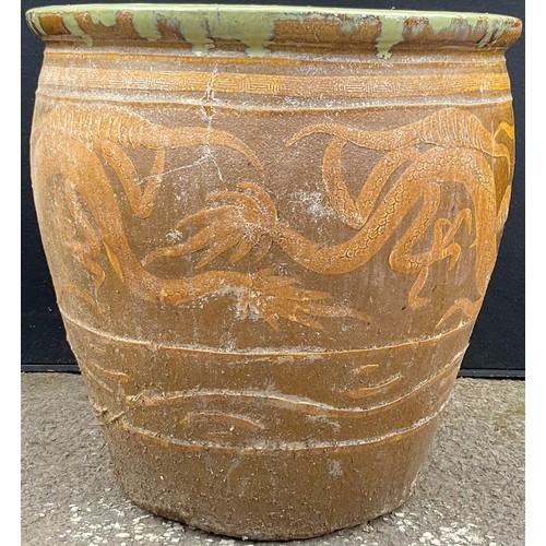 3131 - A garden planter, decorated with a dragon in mustard, on a tan ground


**Please note that some of t... 