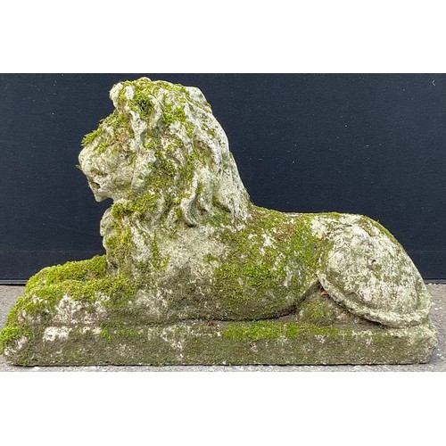 3135 - A composite  lion, seated, rectangular base length 80cm width 24cm height 80cm



**Please note that... 