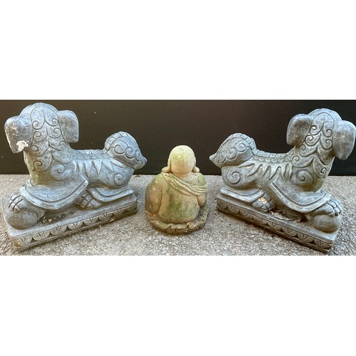 3069 - A pair of 'Chinese' temple lions, 37cm high, 42cm wide;  a Buddha, 27cm high (3)


**Please note tha... 