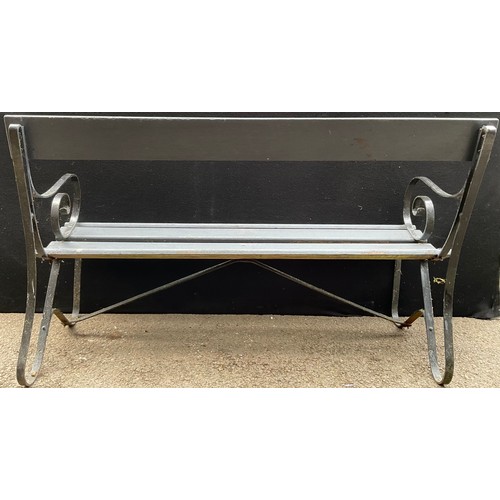 3083 - A wrought iron and wooden slatted garden bench, 133cm wide


**Please note that some of the lots in ... 