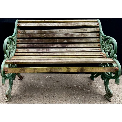 3137 - A Victorian style cast iron framed garden bench, 84cm high, 114.5cm wide, the seat 108cm wide and 39... 