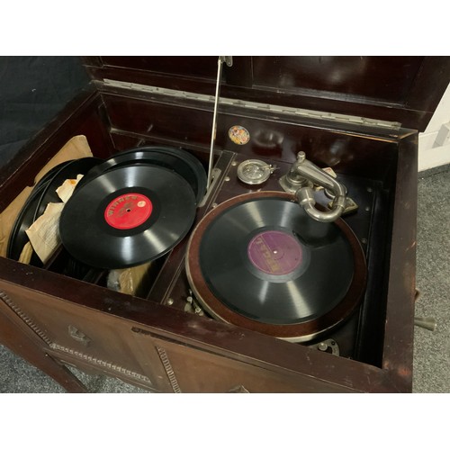 96 - A Gilbert ‘Geisha’ mahogany cabinet gramophone, with a small quantity of early 20th century records.