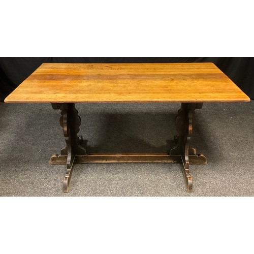 100 - A mid 20th century oak dining room suite, comprising oak trestle table 76cm tall x 144cm x 76cm;  fo... 