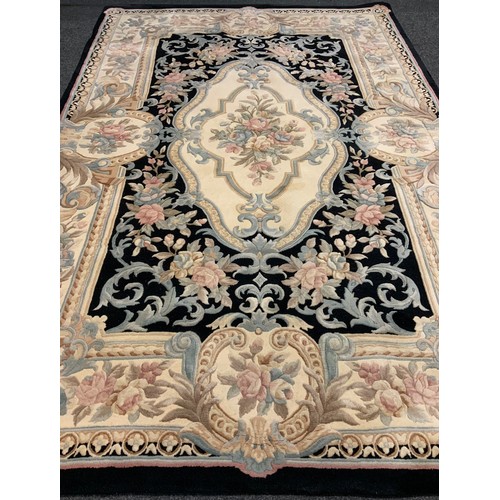 104 - A pure wool Chinese 'Savonnerie' rug / carpet, made for G. H. Frith of Bodelwyddan, UK, in black, wi... 