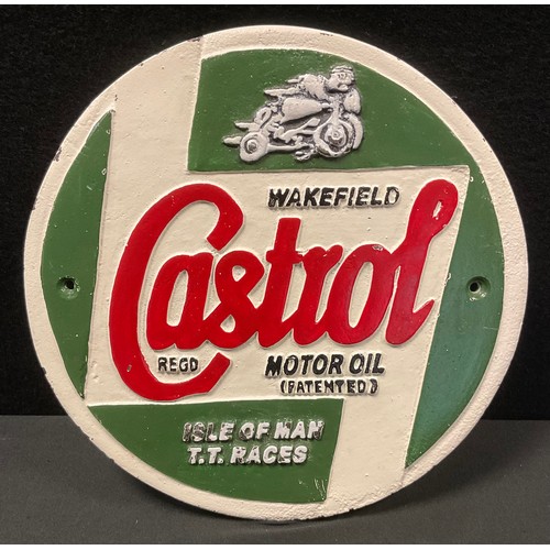 154 - A painted cast iron advertising plaque, Castrol Motor Oil, Isle of Man T.T Races, 24cm diameter