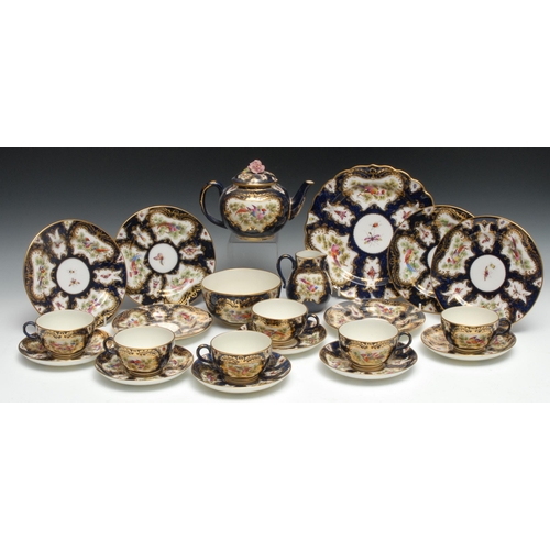 647 - A Royal Worcester tea service, for six,  in the 18th century taste, each decorated with fanciful bir... 