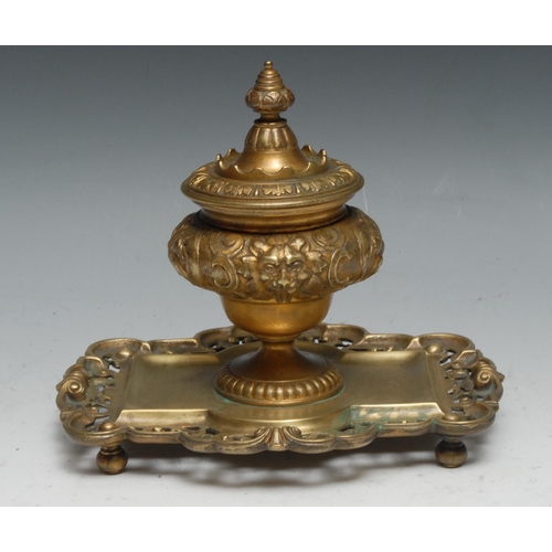 1399 - A 19th century gilt bronze urnular inkwell, cast in the Renaissance Revival taste with foliate masks... 