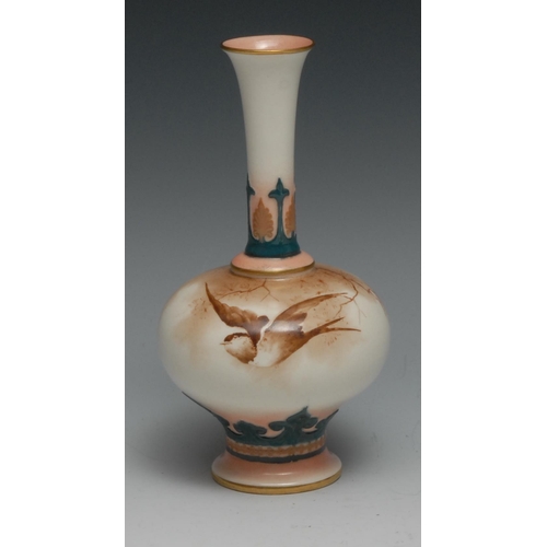 568 - A Hadley's Worcester slender bottle vase, painted in sepia tones with a swallow in flight, the neck ... 