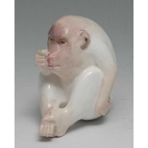 632 - A Royal Worcester 'netsuke', of a white ape, seated, 7cm high, crown and circle mark in green, c.191... 