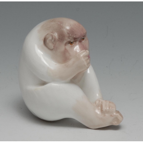 632 - A Royal Worcester 'netsuke', of a white ape, seated, 7cm high, crown and circle mark in green, c.191... 