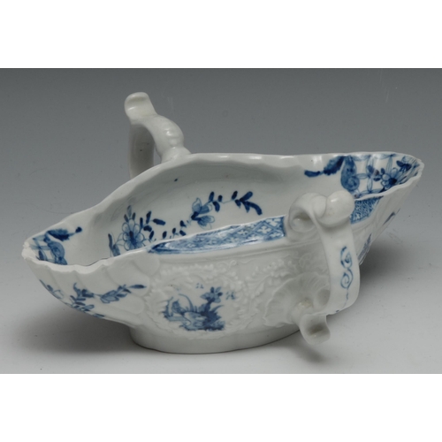 673 - A Worcester two handled sauceboat,  painted with the Two Handled sauceboat landscape with four circu... 