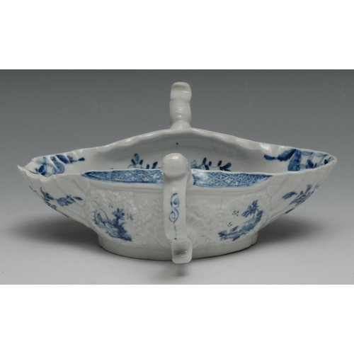 673 - A Worcester two handled sauceboat,  painted with the Two Handled sauceboat landscape with four circu... 