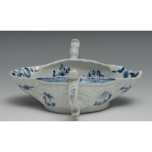 673 - A Worcester two handled sauceboat,  painted with the Two Handled sauceboat landscape with four circu... 