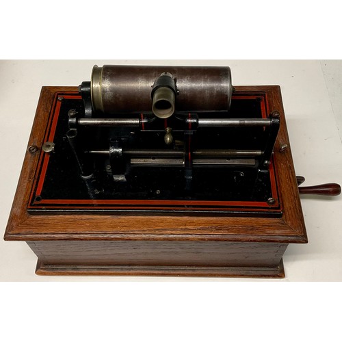 1326 - An early 20th century Excelsior EWC phonograph, in black, outlined in red,  30cm wide