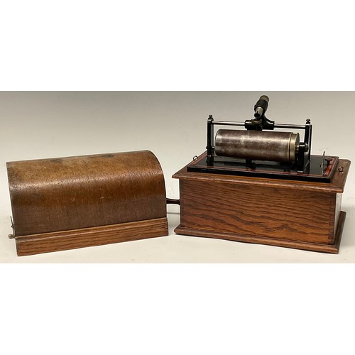 1326 - An early 20th century Excelsior EWC phonograph, in black, outlined in red,  30cm wide