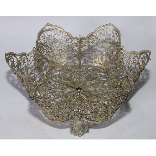 184 - A gilt silver coloured metal filigree shaped circular basket, possibly Russian, 27cm diam, apparentl... 